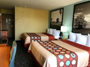 Voodi või voodid majutusasutuse Super 8 by Wyndham Union Gap Yakima Area toas