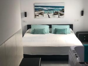 Cama o camas de una habitación en Suites D'Elice