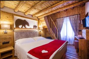 מיטה או מיטות בחדר ב-Hotel Pilier D'Angle & Wellness