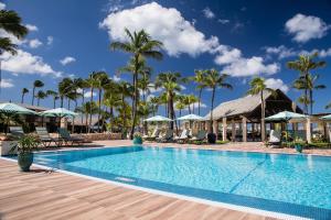 a pool at the resort at Manchebo Beach Resort and Spa in Palm-Eagle Beach