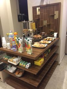 a buffet line with various food items on it at Beatus Suites And Rooms B&B in Canicattì