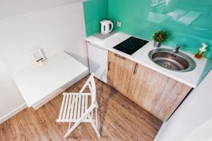 Kuchnia lub aneks kuchenny w obiekcie Apartamenty Novomiejska 17