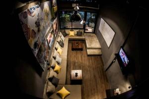 an overhead view of a living room in a tiny house at In a Box Hostel in Bangkok