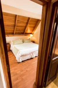 Postel nebo postele na pokoji v ubytování Tunqueley Hotel