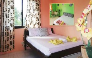 Giường trong phòng chung tại Boracay Actopia Resort