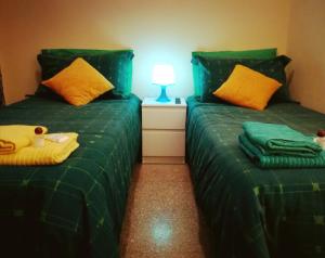 A bed or beds in a room at B&B Stelle Di Roma