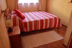 Cama o camas de una habitación en Cabañas Don Gaspar