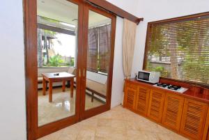 Kuchyň nebo kuchyňský kout v ubytování Agung Bali Nirwana Villas and Spa