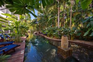 The swimming pool at or close to Palm Cove Paradise - Couples spa beach getaway