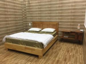 Llit o llits en una habitació de Ruby Dalat Hostel