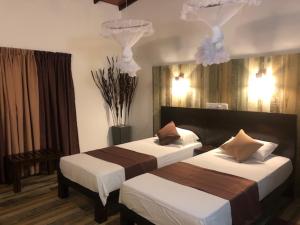 Voodi või voodid majutusasutuse Ypsylon Tourist Resort toas