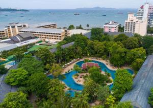 an aerial view of a resort with a pool at The Green Park Resort in Pattaya North
