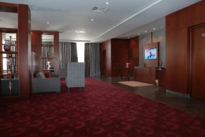 Concorde Sfax Centre的电视和/或娱乐中心