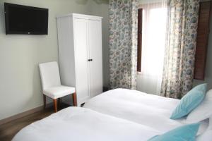 Łóżko lub łóżka w pokoju w obiekcie Casa Rural El Olivar de Valdefuentes