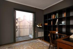 a room with a door leading to a balcony at Victory Apartments in Stockholm