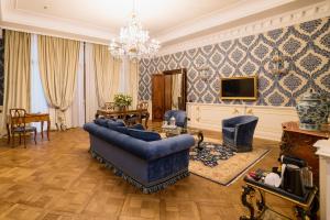 TV a/nebo společenská místnost v ubytování Hotel Ai Reali - Small Luxury Hotels of the World + 37 fotografií