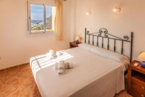 Posteľ alebo postele v izbe v ubytovaní Villas Guzman - Apartamento Murillo
