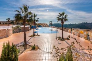 Bazén v ubytovaní Villas Guzman - Apartamento Murillo alebo v jeho blízkosti