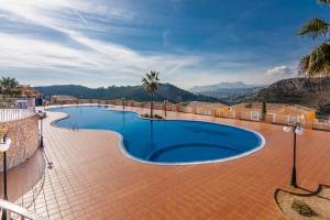 Bazén v ubytovaní Villas Guzman - Apartamento Murillo alebo v jeho blízkosti