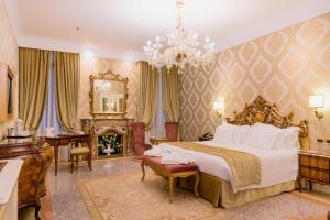 Postel nebo postele na pokoji v ubytování Hotel Ai Reali - Small Luxury Hotels of the World