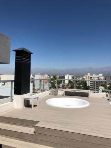 a large tub on the roof of a building at Depto Altos Juramento in Salta