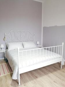 Posteľ alebo postele v izbe v ubytovaní B&B Casa Dalma
