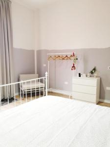 Posteľ alebo postele v izbe v ubytovaní B&B Casa Dalma