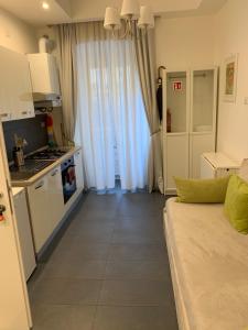 A kitchen or kitchenette at Rome Together Guest House