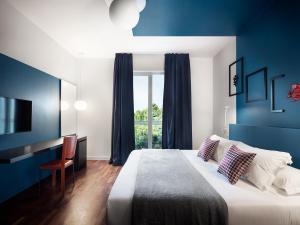 Postel nebo postele na pokoji v ubytování Villa Regina - MarePineta Resort