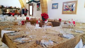 Reštaurácia alebo iné gastronomické zariadenie v ubytovaní Baglio Cudia Resort + 37 fotografií