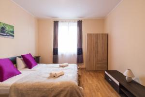 Posteľ alebo postele v izbe v ubytovaní Aqua Line Apartmanház