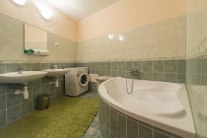 Kúpeľňa v ubytovaní Aqua Line Apartmanház