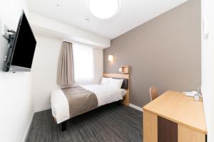 TV a/nebo společenská místnost v ubytování Pearl Hotel Shinjuku Akebonobashi