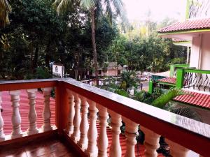 Balkon atau teras di Dio's Guest House