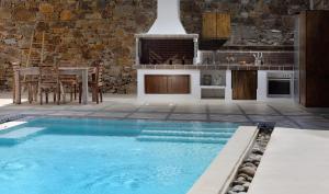 Bazén v ubytování Elegant Mykonos nebo v jeho okolí