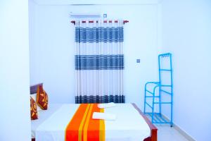 Postel nebo postele na pokoji v ubytování Hotel Kiyara