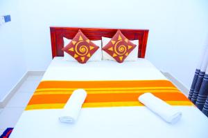 Postel nebo postele na pokoji v ubytování Hotel Kiyara