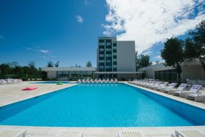 Bazén v ubytování Hotel Melodia nebo v jeho okolí