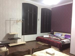 Postel nebo postele na pokoji v ubytování Guest House Loza