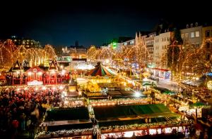 an image of a christmas market at night at XII Apostel Albergo in Cologne