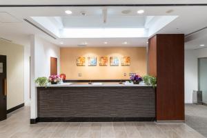 a lobby of a hospital with a reception desk at Pearl Hotel Shinjuku Akebonobashi in Tokyo