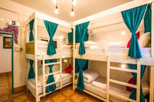 Ένα ή περισσότερα κρεβάτια σε δωμάτιο στο Wander Station Varanasi