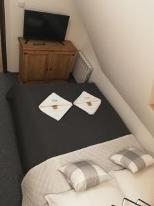 Cama o camas de una habitación en Willa Lichajówka