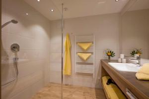 Koupelna v ubytování Hotel Theresia Garni