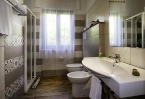 Kylpyhuone majoituspaikassa Residence Appartamenti Caffarena