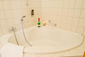 Koupelna v ubytování Hotel Thüringer Hof + 22 fotografií
