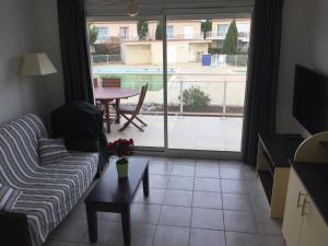 Χώρος καθιστικού στο T 3 appart les jardins du phœbus