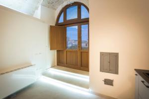 A bed or beds in a room at DiVinum