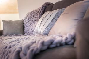 A bed or beds in a room at DiVinum