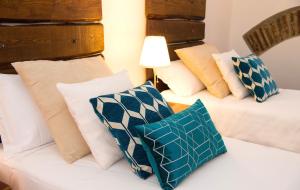 Кровать или кровати в номере DormiRoma - Cedro 21 Apartments